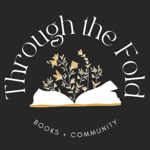 Open book with flowers blooming and "Through the Fold, Books + Community" around the outside